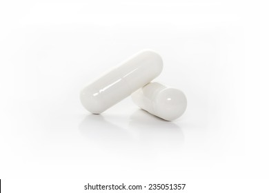 closeup white medicine capsules