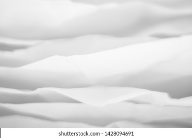 Closeup of white paper layers stack abstract art background. Blur clouds effect. Copy space.