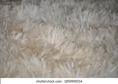 Closeup Of White Synthetic Shag Carpet