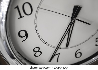 Close-up wide angle view of the clock . Concept of time or business.
