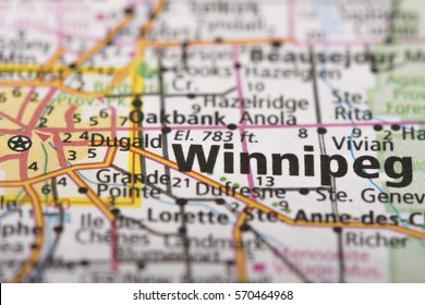 Closeup Of Winnipeg, Manitoba On A Road Map Of Canada.