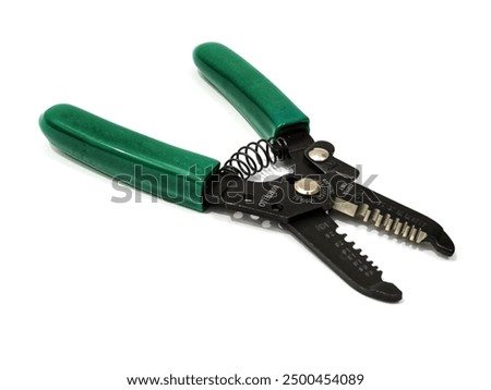 Close-up of a wire stripper tool isolated on a white background. The sharp cutting edges and ergonomic design are emphasized, showcasing its efficiency in stripping cables and wires. 