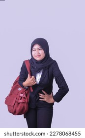 closeup, A woman in black suit with red bag holding her menstruation belly, studio concept isolated on white - Shutterstock ID 2278068455