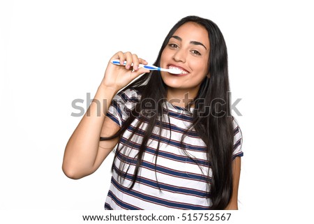 Close-up woman brushing her teeth. Isolated white background.