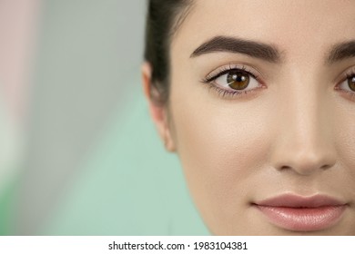 Close-up of woman face with result after lash lift laminating botox procedure. Eyelash Care Treatment: eyelash lifting and curling, lash lamination and extension.