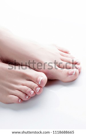 Closeup woman feet. Legs with nail polish pedicure fingers. Health care concept body part