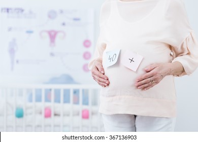 Close-up Of Woman And First Pregnancy After Forties