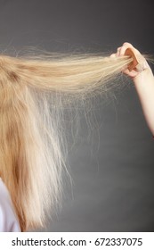 Closeup Of Woman Girl With Static Blonde Long Hair. 