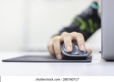 Closeup Of Woman Hand Clicking Mouse