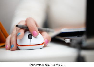 Closeup Of Woman Hand Clicking Mouse