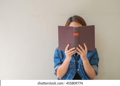 Closeup Woman Hand Holding A Book To Read