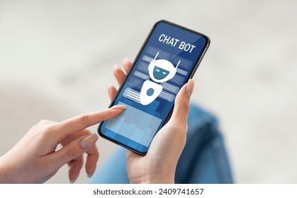 Closeup woman hands using chatbot on smartphone, touching screen, home interior. Cropped of lady using virtual help communicating with online chat assistant on cell phone