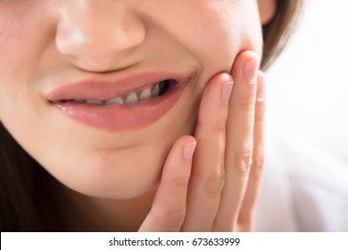 Close-up Of A Woman Having Tooth Problem