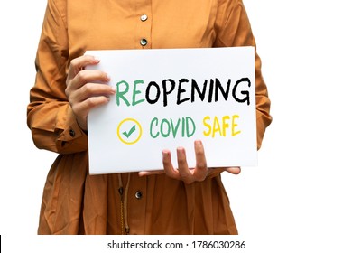 Closeup Woman Holding A Notice Reopening Covid Safe