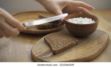 Close-up - Woman Makes Vegetarian Toast With Soy Cheese.