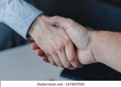 Closeup of woman and man business handshake. Hands together. Work agreement and colaboration, Successful negotiantion and cooperation. Business, freelance, job concept