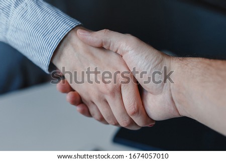 Closeup of woman and man business handshake. Hands together. Work agreement and colaboration, Successful negotiantion and cooperation. Business, freelance, job concept