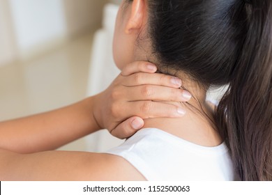 Closeup Woman Neck And Shoulder Pain And Injury. Health Care And Medical Concept.