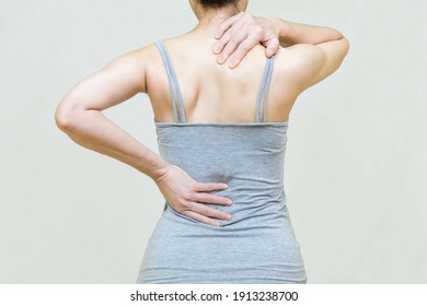 Closeup Woman Neck,shoulder, Back Pain And Waist Injury. Health Care And Medical Concept.