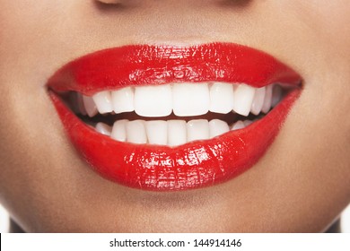 Closeup Of Woman With Red Lips Smiling