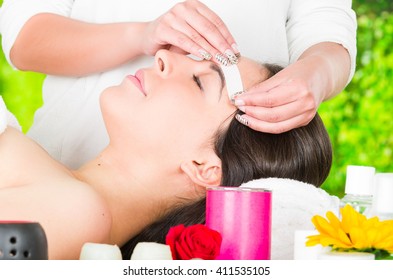 Closeup Womans Face Receiving Facial Hair Wax Treatment, Beauty And Fashion Concept