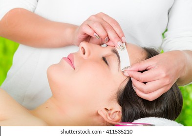 Closeup Womans Face Receiving Facial Hair Wax Treatment, Beauty And Fashion Concept