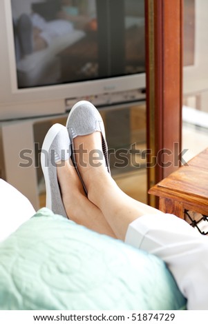 Close-up of woman's foot in a living-room
