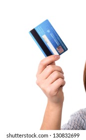 Closeup Of A Woman's Hand Holding Up A Credit Card.