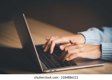 Close-up of a woman's hand pressing on the laptop keyboard, World of technology and internet communication, Financial professionals use laptop - Shutterstock ID 2184886111