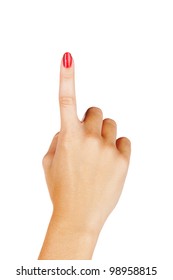 Close-up Of Woman's Hand With Red Nails Pointing With Index Finger On White Background.