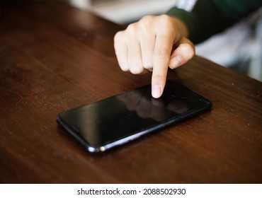 Close-up of woman's hand typing message. concept of shopping or planning business on touchphone. Businesswoman using wireless device. - Shutterstock ID 2088502930