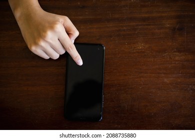 Close-up of woman's hand typing message. concept of shopping or planning business on touchphone. Businesswoman using wireless device. - Shutterstock ID 2088735880