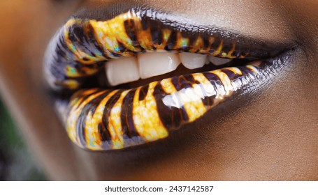 Close-up: a woman's lips with giraffe colors.