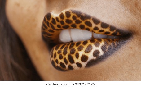 Close-up: a woman's lips with giraffe colors.