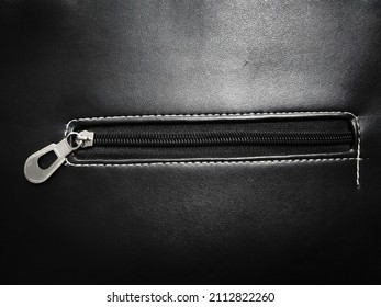 Close-up Of Women's Leather Handbag Zip Fastener Or Zipper Lock Isolated