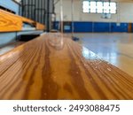 Close-up of wooden bleachers in an empty school basketball court, gymnasium.