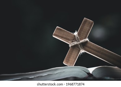 Closeup Of  Wooden Christian Cross  On Bible,  God, Wooden Cross Of Jesus.