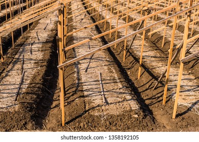 Closeup Of Wooden Frames For Spring Planting Of Ginseng Crop In Small Rural Mountain Farm Community.