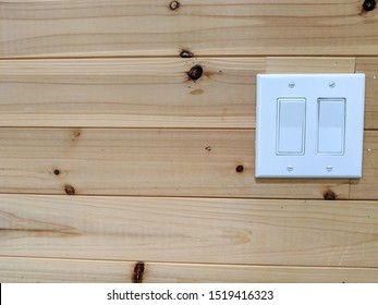 Closeup Of Wooden Wall With Light Switch