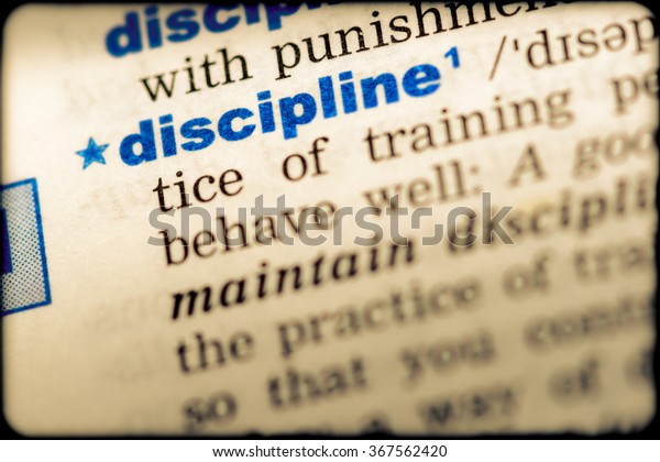 closeup-word-english-dictionary-discipline-definition-stock-photo