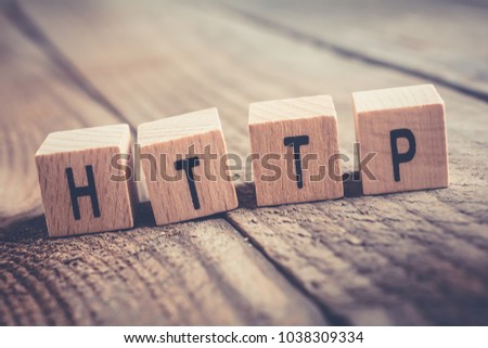 Closeup Of The Word HTTP Formed By Wooden Blocks On A Wooden Floor