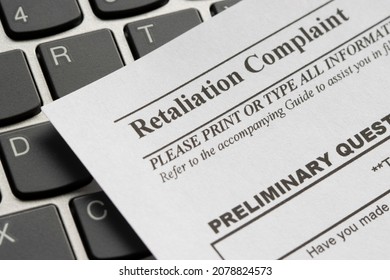 Closeup Of A Workplace Retaliation Complaint Form.