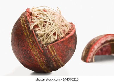 Close-up Of A Worn Out Cricket Ball