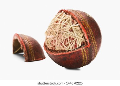 Close-up Of A Worn Out Cricket Ball