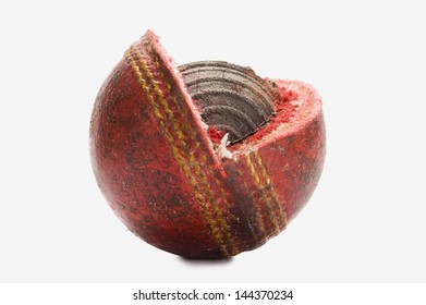 Close-up Of A Worn Out Cricket Ball