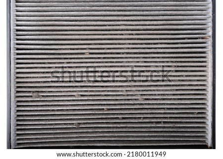 Close-up of worn out and dirty cabin air filter