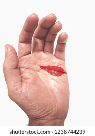 Close-up of wounds are cut with a knife or a sharp object on the skin of the human and blood is red cut on skin. isolated on white background,  medical emergency treatment concept, 2 Dec 2022 india