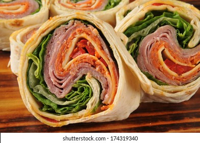 Closeup Of A Wrap Sandwich With Salami, Pepperoni, And Cheeses