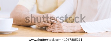 Similar – Image, Stock Photo Hand holding coffee, woman drinking in background