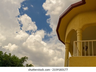 A Closeup Of A Yellow Building In Kigali, Rwanda